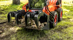 Ignite Attachment bucket grapple holding logs. and rocks.