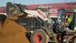 A Bobcat wheel loader dumps dirt 2026 MoonPay X Games League (XGL) competition.