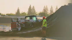 Bobcat compact track loaders work a BMX ramp. Like gnarly.