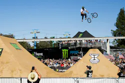 Brady Baker goes big during BMX Dirt Best Trick at the 2026 X Games in Sacramento, where he earned the silver medal behind Ryan Williams.