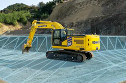 Komatsu PC220 excavator with grade control grid surrounding it.
