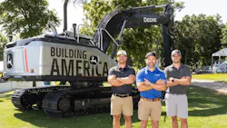 John Deere Building America Contest. Three finalists stand in from of a John Deere excavator.