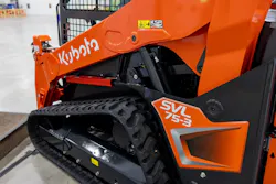 A Kubota SVL75-3 compact track loader sitting in the factory.