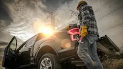 Contractor Field Research Future Construction Site. Field Work. Caucasian Worker and His Company Pickup Truck