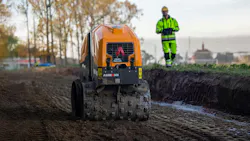 Ammann remote control trench roller, compacting a trench.