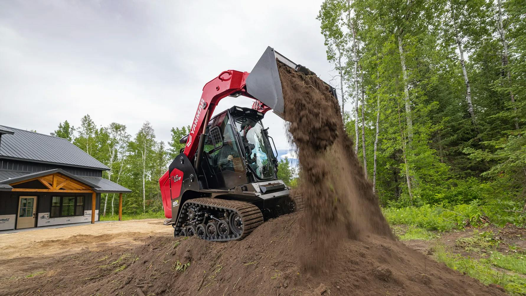 Yanmar CTL dumping dirt