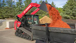 Yanmar CTL dumping into truck