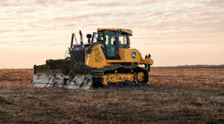 A John Deere 850 X-Tier dozer, shredding dirt in the morning.