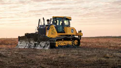 A John Deere 850 X-Tier dozer, shredding dirt in the morning.