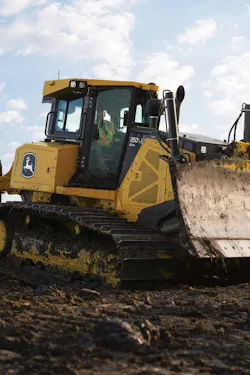 John Deere 850 X-Tier=4 dozer, moving through the dirt.