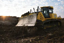 John Deere 850 X-Tier dozer operating in the sunlight.
