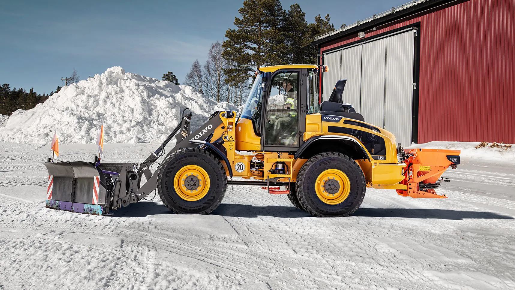 Volvo Compact Wheel Loader outfitted for snow work.