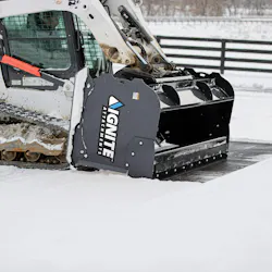 Ignite Snow pusher using a back-drag kit to remove snow.
