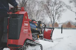 Boss ATV Poly Straight Blade on a Toro Dingo in the snow.