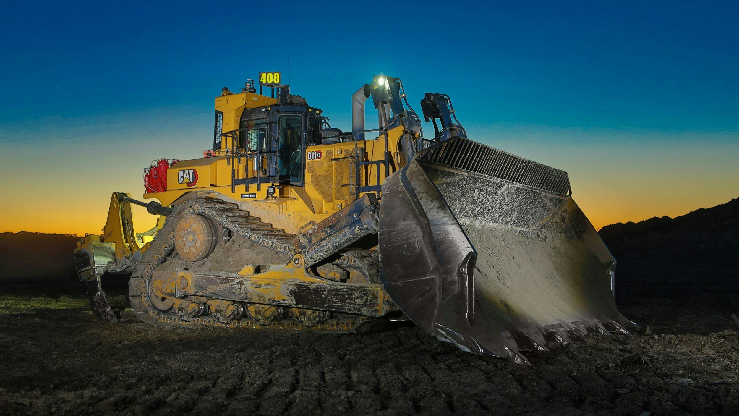 Cat D11 XE dozer at dawn