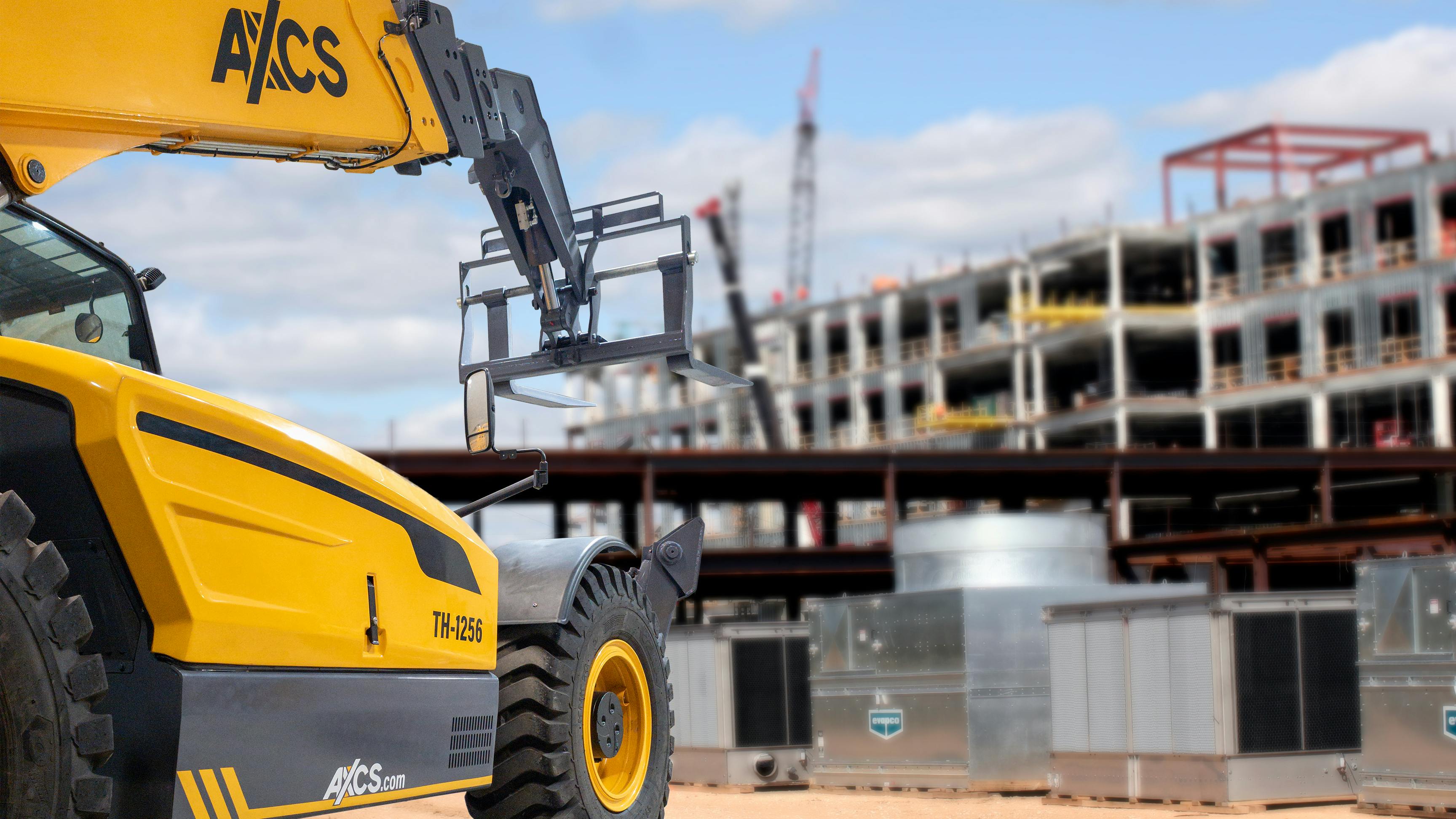 AXCS TH-125636 telehandler at a construction site.