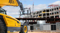 AXCS TH-125636 telehandler at a construction site.