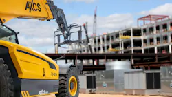 AXCS TH-125636 telehandler at a construction site.