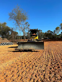 Bomag BC 473 EB-5 soil compactor rolling toward the camera.