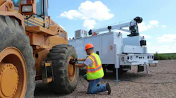 VMAC hydraulic air compressor on a crane truck working on a wheel loader