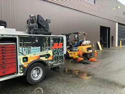 VMAC G30 service truck working a fork lift