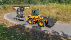 Volvo loader tows equipment trailer