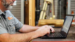 Fleetio Customer with Laptop