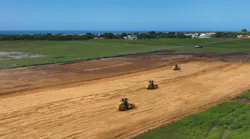 Rollers construct airport runway