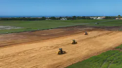 Rollers construct airport runway