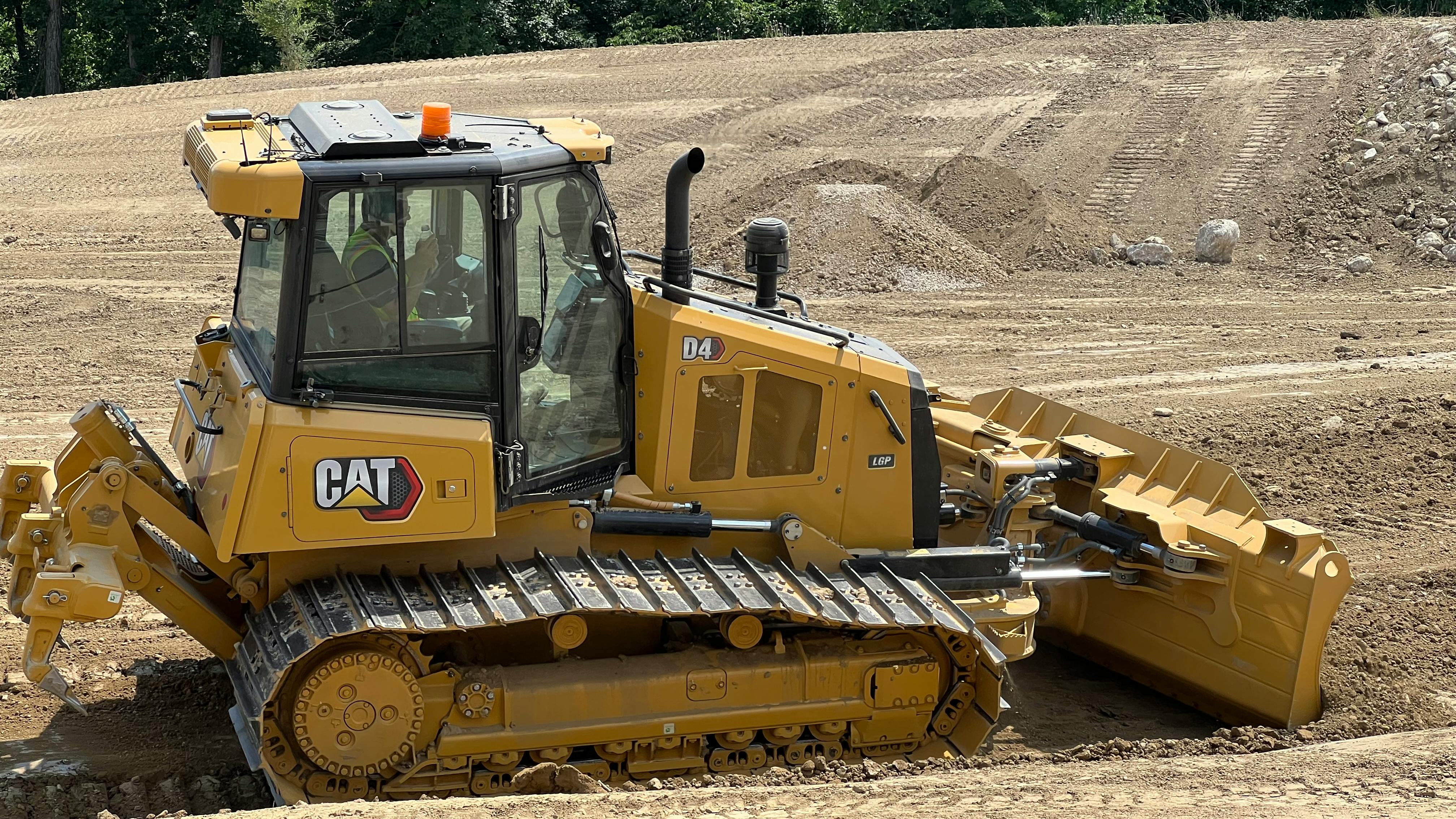 Cat dozer pushing dirt