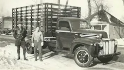 An Omaha Standard livestock body rides on a 1942 Ford truck