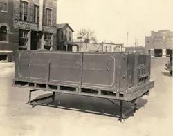 An early Omaha Standard truck body sits ready for installation.