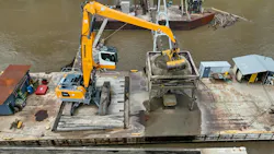 Liebherr LH 60 C Material Handler working on a Gateway barge operation.