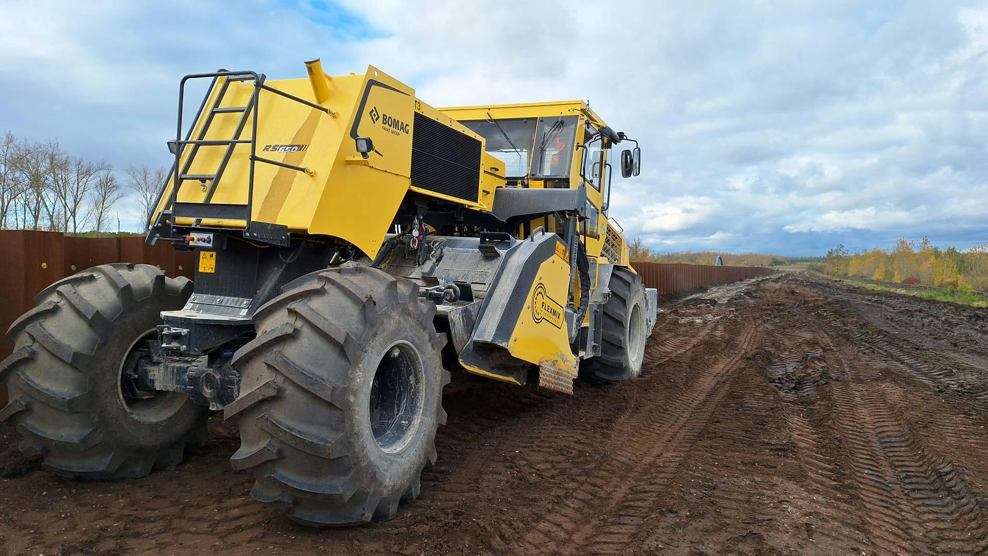 BOMAG recycler on road seen from rear