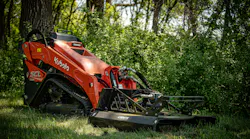 Ignite 44-inch Mini Brush Cutter on a Kubota mini skid steer, sitting in the woods.