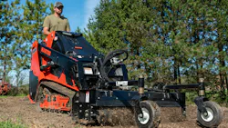 Manitou mini track loader with rake