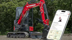 A Yanmar excavator sits behind a big phone, symbolizing the Yanmar SmartAssist Remote telematics platform .