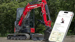 A Yanmar excavator sits behind a big phone, symbolizing the Yanmar SmartAssist Remote telematics platform .