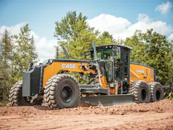 A Case Construction Equipment GR935 motor grader, moving dirt.